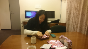 Azusa unwrapping her gifts
